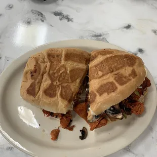 Acapulco Torta (pork, grilled mushrooms, Oaxacan cheese, and added grilled pineapple). Outstanding!