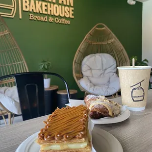 a plate of pastries and a cup of coffee