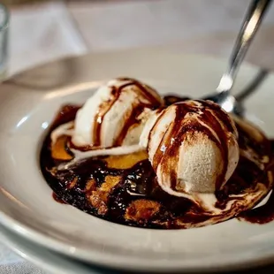two scoops of ice cream on a plate