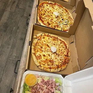 order of breadsticks, 14&quot; 1/2 pepperoni-1/2 green pepper, banana pepper, black olives. 12&quot; Cheese,  Club salad with Italian dressing.