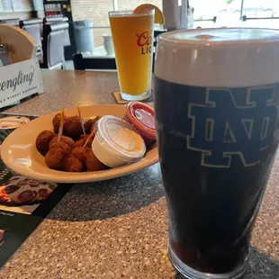 Fried mushrooms with. Side of Guinness and Bluemoon