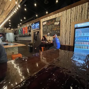 Canned beer and merchandise available to grab and go