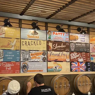 a wall of beer barrels