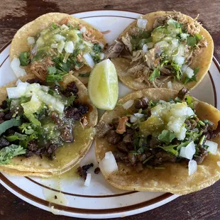 Tacos made with corn tortillas 2 chicken Pastor Carnitas