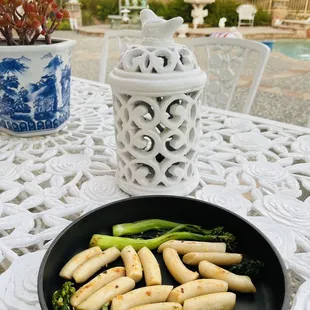 Sautéed Korean rice cakes with Chinese broccoli