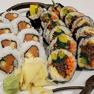 a platter of sushi rolls