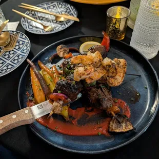Beef Tenderloin Kebab with Grilled Shrimp and Heirloom Carrots. Across from me, is the Demi-Glaze Pork Ribs