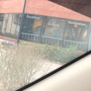 The cafe view from within my car.