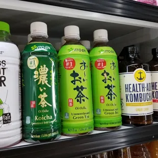 a variety of drinks on a shelf