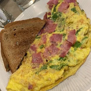 an omelet and toast on a plate