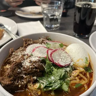 a bowl of beef and noodles