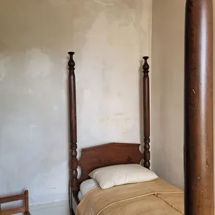 The bedroom of an enslaved worker. This house held four people in slavery, the sister property held 8.