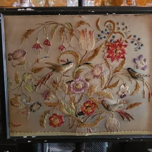 An example of raised needlepoint in the upstairs bedroom.