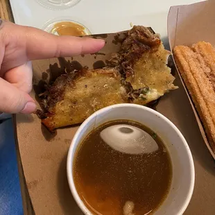 If you were planning on getting the Birria tacos..... they're about finger length tacos and the "Birria" is more like a boxed beef broth