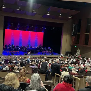 a large auditorium full of people