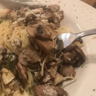 A big bite of cappelini in oil, touch of garlic, and some delicious mushrooms. A first for me. Great!