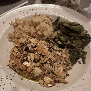 Wifey's salmon almandine (delicious) with greens and pilaf. I'd get it next time. Or anything on menu I'm thinking...