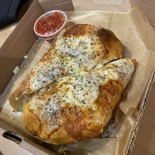 a slice of pizza in a box