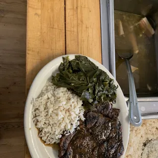 Grilled steak butter rice, collard greens
