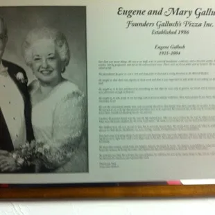 an old picture of a man and woman