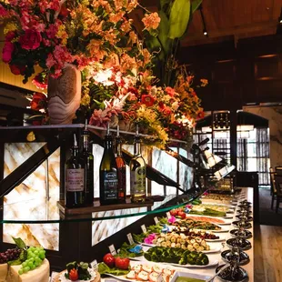 Hearts of palm, artichoke, sweet beets, asparagus, caprese salad, imported cheeses, and cured meats are only some of the almost 40 items.