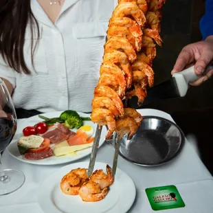 We offer grilled jumbo shrimp lightly marinated to a savory citrus perfection. All seafood is included.