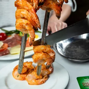 We offer grilled jumbo shrimp lightly marinated to a savory citrus perfection. All seafood is included.