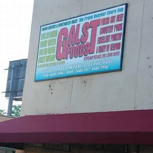 a sign on the side of a building