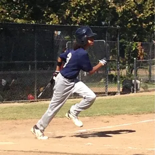 Oliver taking off after a base hit.