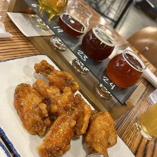 Beer flight and $1 wings with mango habanero sauce