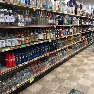 empty liquor shelves in a grocery store