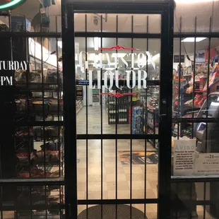 the entrance to a liquor store