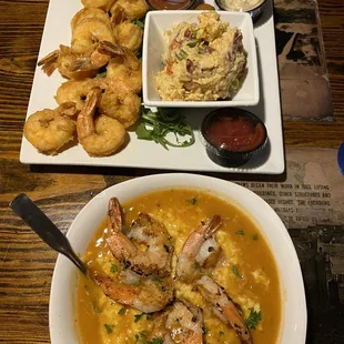 Top picture- Fried shrimp and crawfish potato salad.  Bottom picture- shrimp and grits with crawfish étouffée.