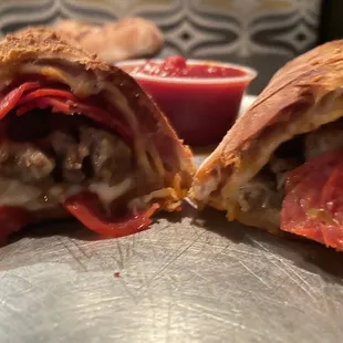 a close up of a sandwich cut in half