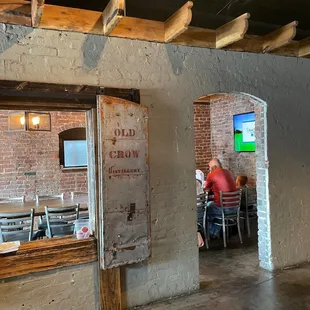 a man sitting at a table in a restaurant
