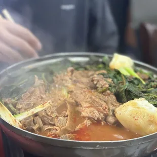 a person cooking in a pot