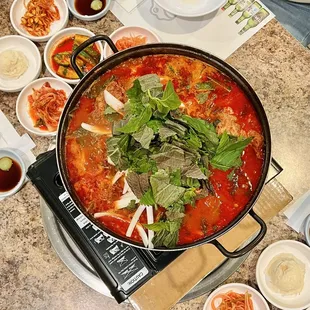 a pot of soup on a table