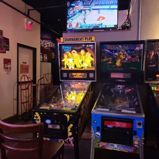 a row of pinball machines