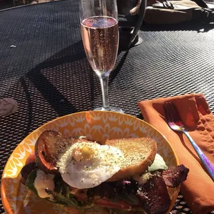 BLAT with poached egg and elderberry mimosa