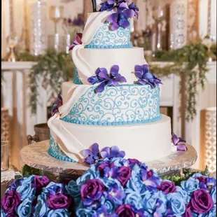 Our wedding cake. A white almond flavor with white icing. Gum paste orchids!