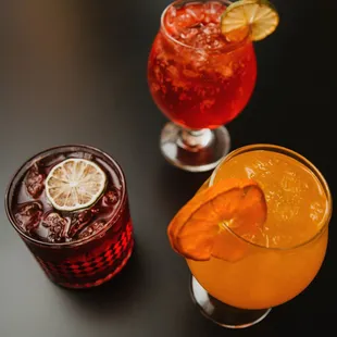 Hard seltzer cocktails (Moon Landing, Cherry Bomb, and Up the Crows!)