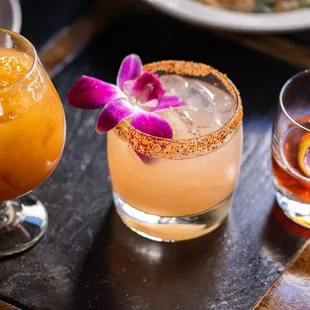 two cocktails on a table