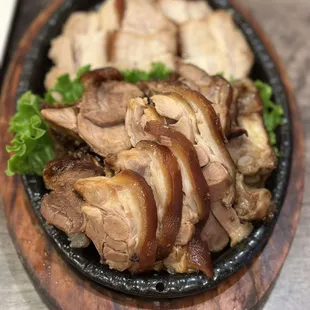 a plate of meat and vegetables