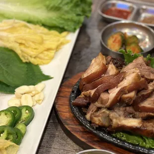 a plate of meat and vegetables