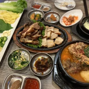 a variety of dishes of food on a table