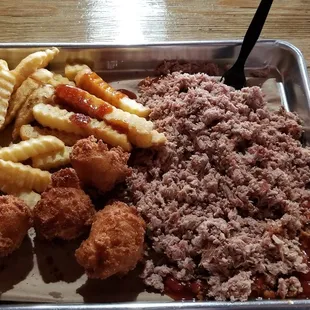 Chopped pork entree. Sweet tea and some puppies.