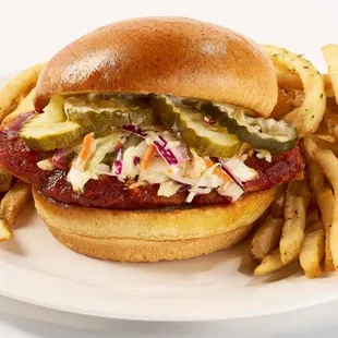 a hamburger and fries on a plate