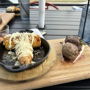 Grilled corn, wild boar meatball, waygyu beef meatball.