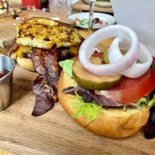 BYOB: brioche bun, angus, cheddar, grilled pineapple, bacon, &amp; freebies