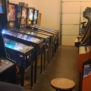 a row of pinball machines